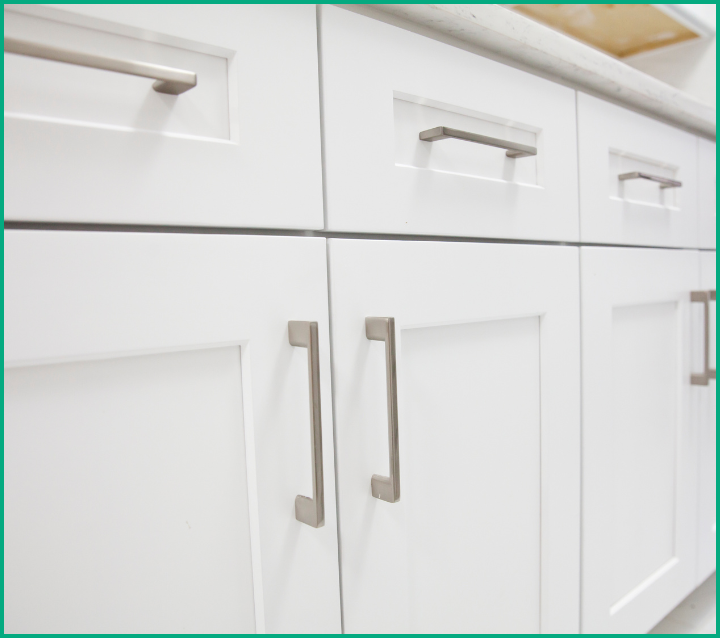 Spacious kitchen with Shaker cabinets, emphasizing functionality and aesthetic charm for homeowners.